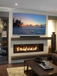 Lp fireplaces, or liquid propane fireplaces, are also viable options for a variety of linear fireplace styles. Stacked Stone Mantel With Linear Gas Fireplace Linear Gas Fireplace Linear Fireplace Modern Fireplace