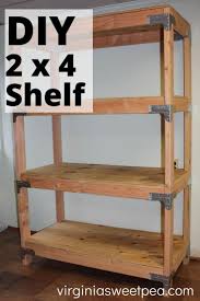 Did you secure the vertical 2x4's to the concrete garage floor? Diy 2x4 Shelving Unit Diy Wood Shelves Diy Storage Shelves Diy 2x4