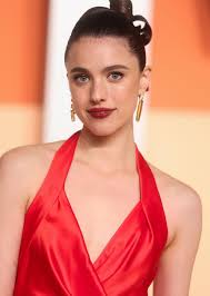 Margaret Qualley in customized Chanel RTW Spring/Summer 1989 she wore to  dance in during the James Bond tribute at the 97th Annual Academy Awards.  She stayed in the outfit for the Vanity