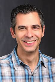 Biology faculty awarded for faith engagement and research