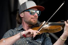 I would love to see some photos of the band that include Chris Arduser, if  any exist.