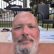 Is there adequate parking at Little Woodrow's and is it better to uber  there?