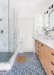 Bring a sense of serenity to your interior with these beautiful designs for a blue kitchen backsplash, blue tile bathroom, calming blue shower, or even a we have the biggest online selection of blue tile for any space! Teak Bath Mat On White And Blue Mosaic Tiles Transitional Bathroom