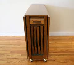 Drop Leaf Table With Storage For Folding Chairs A Multi Utility Device Serving A Variety Of Purpose Drop Leaf Dining Table Folding Dining Table Chair Storage