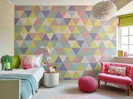 When Decorating A Cute Bedroom For A Tween Use Fun Colors To Create A Geometric Accent Wall Girls Bedroom Themes Diy Girls Bedroom Girls Room Design
