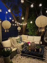 The Best Way To Use Festoon Lights In Your Garden Melanie Jade Design Festoon Lighting Garden Festoon Lighting Small Patio Garden
