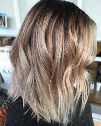 There's no doubt that dark brown hair is gorgeous, but if you're looking to add a bit of dimension to your strands or simply want to switch up your hair color maintenance level: Picture Of Elegant Blonde And Caramel Balayage In Dark Brown Hair To Get A Contrast