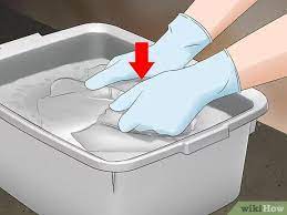 Soak the item in a solution of 1 quart warm water, 1/2 teaspoon liquid dishwashing or laundry detergent, and 1 tablespoon ammonia for 30 minutes. 3 Ways To Get Dye Out Of Clothes Wikihow