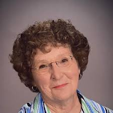 When to cut back iris in zone 6?