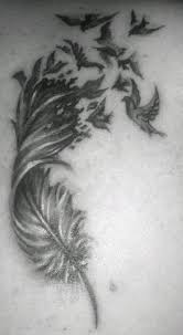 Beautiful Black And White Tattoo Drawings A Beautiful Black And White Tattoo Of A Feather Dissolving Into A Flock Of Birds Feather Tattoos Watercolor Abstract Tattoo Feather Tattoo