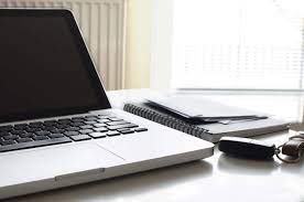 apple black business busy computer desk display electronics equipment keyboard keys laptop light mac macbook modern notebook office paper sc