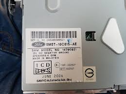 Or without removing unit just press and hold buttons 6 and 1 on radio until the v number displays. I Need A Code For My Ford Focus Radio 6000cd Security Coded Motor Vehicle Maintenance Repair Stack Exchange