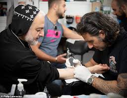 Razzouk has been around for 700 years! Discovering Jerusalem S Sacred Sites And Razzouk Tattoo The Oldest Tattoo Parlour In The World Express Digest