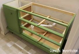 When we decided to start renovating our bathroom last month i knew i wanted a dresser as my new vanity. How To Turn A Dresser Into A Bathroom Vanity Domestic Imperfection