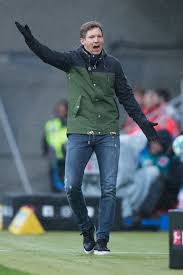 The site lists all clubs he coached and all clubs he played for. Head Coach Julian Nagelsmann Of Hoffenheim Reacts During The Mens Outfits Mens Fashion Casual Coach