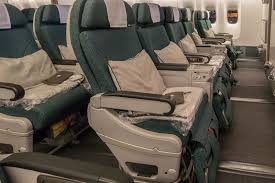 cathay pacific premium economy vs business class