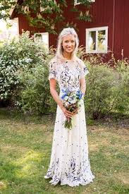 Ties at the shoulder and a tiered look give a floaty feel to the slip silhouette.m&s collection: 25 Embroidered Floral Wedding Dresses With A Wow Factor Weddingomania