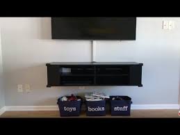 One other trick on how to hide wires behind the tv stand is to simply feed the wires through the tv stand. How To Hide Tv Wires Cords Cables Organize Entertainment Center Fast Easy Youtube