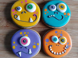 Make sure your cookies are completely cool before you start decorating or the icing will melt as you decorate. Decorated Halloween Monster Sugar Cookies From Sweet Sarah S Halloween Sugar Cookies Decorated Halloween Cookie Recipes Sugar Cookie Designs