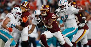 Washington Commanders running back signed by the Seattle 