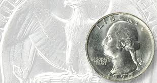 The coin on the right is the heralded misprint quarter that the owner is trying to sell for $35,000. When A 1970 D Quarter Gets Struck On Dime Stock