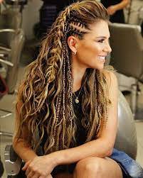 Just gather the hair in a slick half up ponytail completed by the two thin braids on each side of the face that accentuate the hair length. Wild Festival Hairstyles For Women Viking Hair Hair Styles Festival Hair