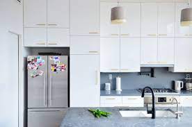 8 Ways To Help Your Fridge Keep Its Cool And Run Better Kitchen Cabinets Grey And White New Kitchen Cabinets Kitchen Cabinets