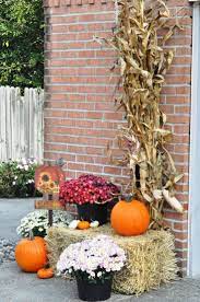Outdoor Fall Decor Mums Hay Bale Pumpkins Harvest Sign Corn Stalks Bundle Of Indian Corn Fall Outdoor Decor Fall Decorations Porch Pumpkin Decorating