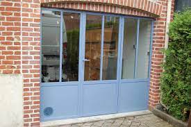 Porte de garage style verriere. Ancienne Porte De Garage Transformee En Facade Style Atelier Porte Garage Porte D Atelier Portes Fenetres Exterieures