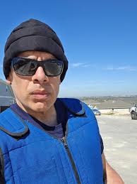 What heat-related issues do people with multiple sclerosis experience?