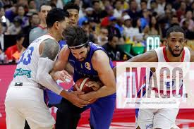 Puerto Rico s players David Huertas (L) and Gary Browne (d) vie for the  ball with