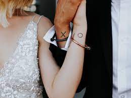 Let's get real about couples' wedding tattoos for a sec. 20 Unique Couples Wedding Tattoos