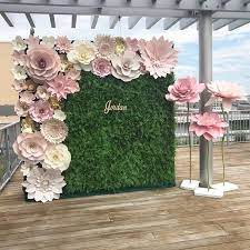 These paper flowers add a whimsical touch to a child's bedroom or playroom either hanging on the wall or tucked into the corner of a bookshelf for decoration. Large Paper Flower Backdrop Giant Paper Flowers Paper Etsy Paper Flower Wall Wedding Flower Wall Wedding Flower Backdrop Wedding