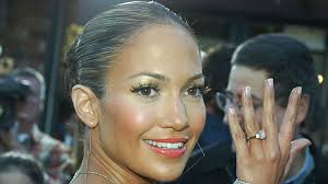 With a photo of them sharing a. As Bennifer Gets Rebooted We Look Back At Jennifer Lopez S Engagement Ring From Ben Affleck Grazia