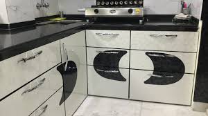 Custom furnish kitchens are aesthetically designed to fullfil individual needs and adapt to available space. Modular Kitchen Design Black And White Home Architec Ideas