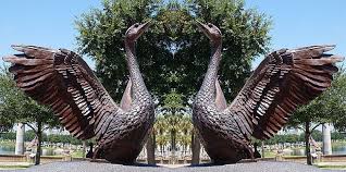 The sweeping sensual and sinuous lines of this piece explore an aesthetic that satisfies, while maintaining balance, intrigue and surprise from all viewing angles. Outdoor Large Bronze Swan Garden Statue For Sale