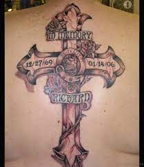 Memorial cross and poppy flower tattoo on forearm 49 Classy Banner Tattoos For Back