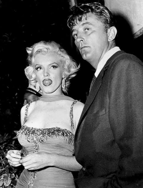 infinitemarilynmonroe — Marilyn Monroe and Robert Mitchum at the St....