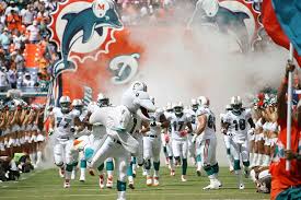 Trending news, game recaps, highlights, player information, rumors, videos and more from fox sports. Hd Wallpaper Miami Dolphins Desktop Background Pictures Crowd Representation Wallpaper Flare