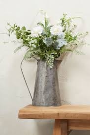 Gone are the days when fresh flowers could be in our busy lives, how many of us can dedicate time to making sure that the flowers in every vase are fresh and whether the plants have been watered or. Wild Floral Mix In Galvanised Jug Fake Plants Decor Fake Flowers Artificial Flower Arrangements