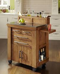 For instant storage and counter space, try a kitchen island or a kitchen cart. Portable Kitchen Islands With Breakfast Bar Ideas On Foter