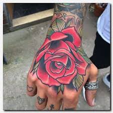 Tatuajes De Mano Hot Tattoo Rose Hand Tattoo Hand Tattoos For Guys Neck Tattoo