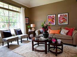 Adding colored walls, photos, artwork, lamps, curtains and pillows can begin to make a room look and feel even smaller. Earthy Living Room Paint Ideas Novocom Top