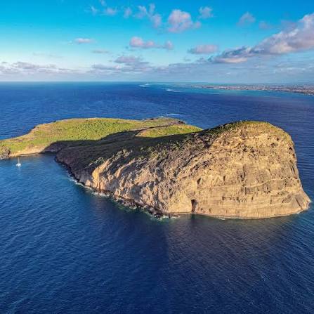 Discovering Gunners Quoin! Locally called 'Coin de Mire,' this small island  to the North of Mauritius is famous for its beautiful cliffs and clear  water and is perfect for snorkeling. Dive in