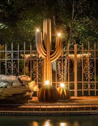 Pin By Gail Abner On Home Desert Outdoor Torches Tiki Torches Cactus Decor