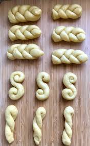 The Many Different Shapes Of Koulourakia Braided Hairpin And Scrolled Greek Cookies Koulourakia Recipe Greek Desserts