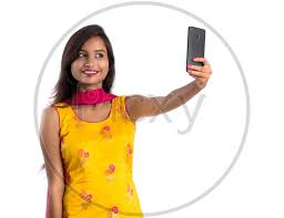 Image of Beautiful Indian Girl Taking Selfie In Smart Phone-CT283457-Picxy