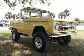 1969 Half Cab Bronco With A Clean Empire Yellow Paintjob Earlyfordbroncos Classicfordbronco Fordbronco Velocityresto Pickup Trucks Ford Trucks Ford Bronco