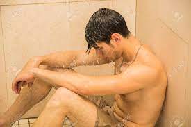 If your shower has enough room, a bench or seat is a great option for someone who is unable to stand to bathe or who simply likes to sit and relax under the warm water for a while. Close Up Attractive Young Bare Sad Worried Young Man Taking Shower Stock Photo Picture And Royalty Free Image Image 45456279