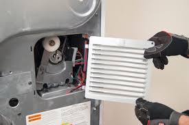 The new belt and idler. How To Replace A Laundry Center Dryer Drive Belt Repair Guide